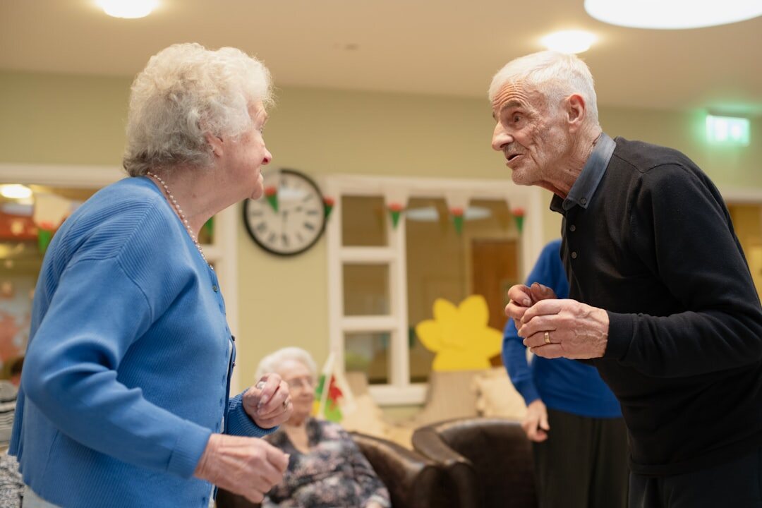 Seniors doing gentle exercise class together